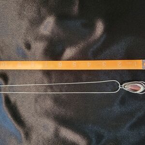 Elegant Silver Necklace with Teardrop Pendant